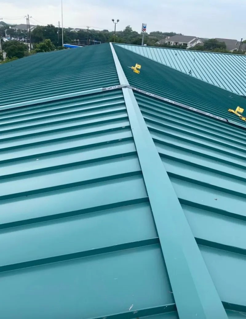 Green commercial metal roof ridge and valley for Metal Roof Repair in Chicopee